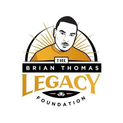 The logo is orange themed with Brian's face on it.